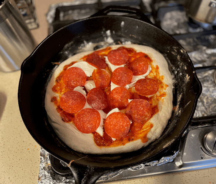 As the bottom cooks, the crust will start to puff up.